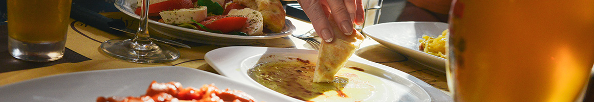 Eating Greek Mediterranean at Mykonos restaurant in Springfield, MA.